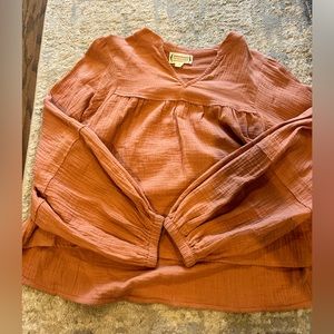 Boutique brand, light pink blouse.